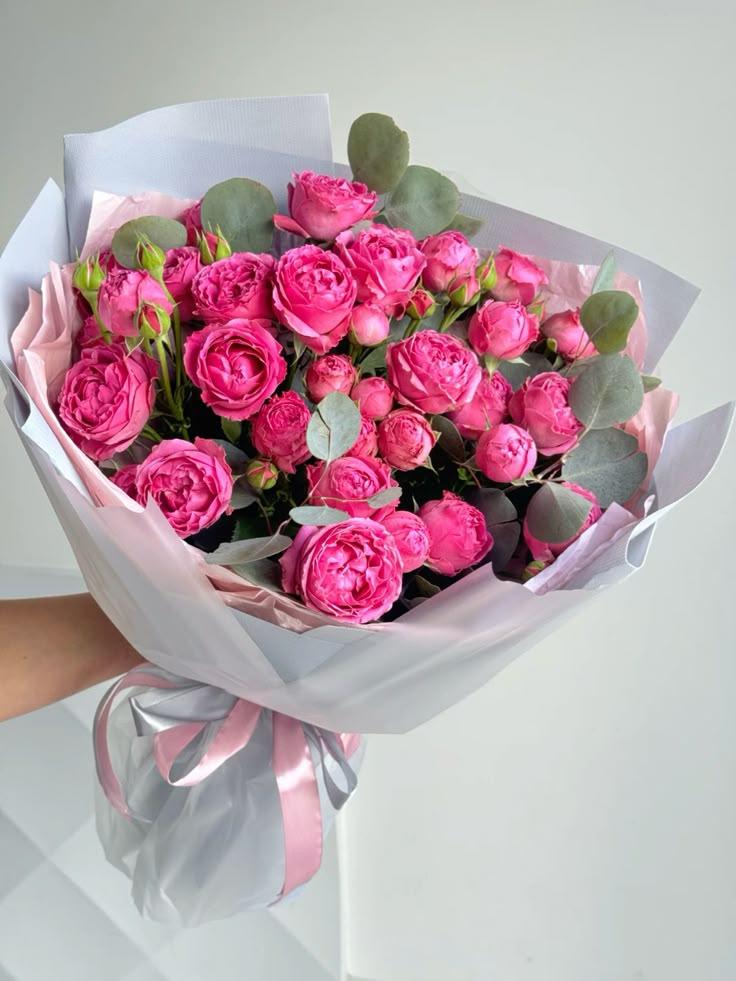 Professional floral arrangement in modern corporate setting